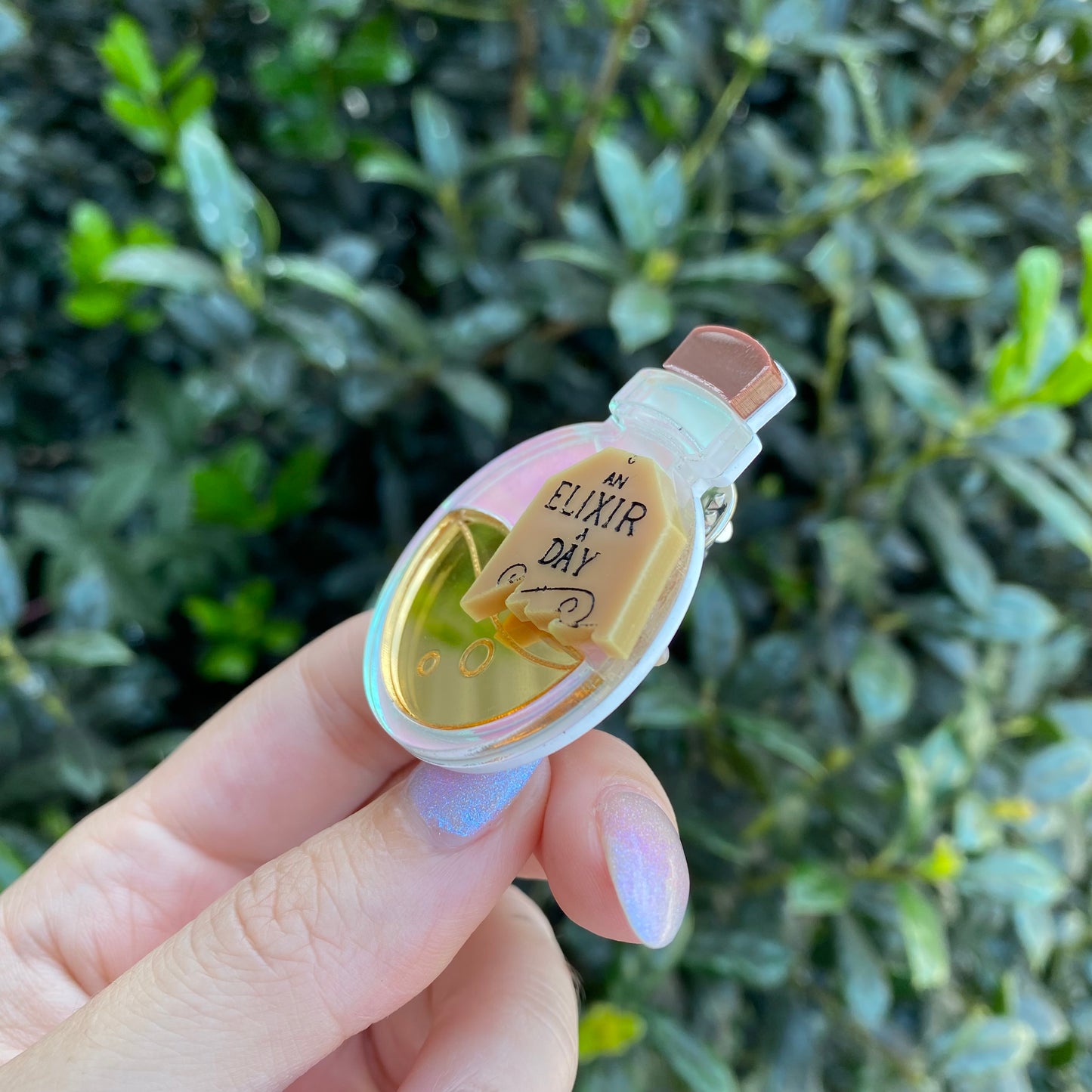 A Golden Elixer a Day Acrylic Pin