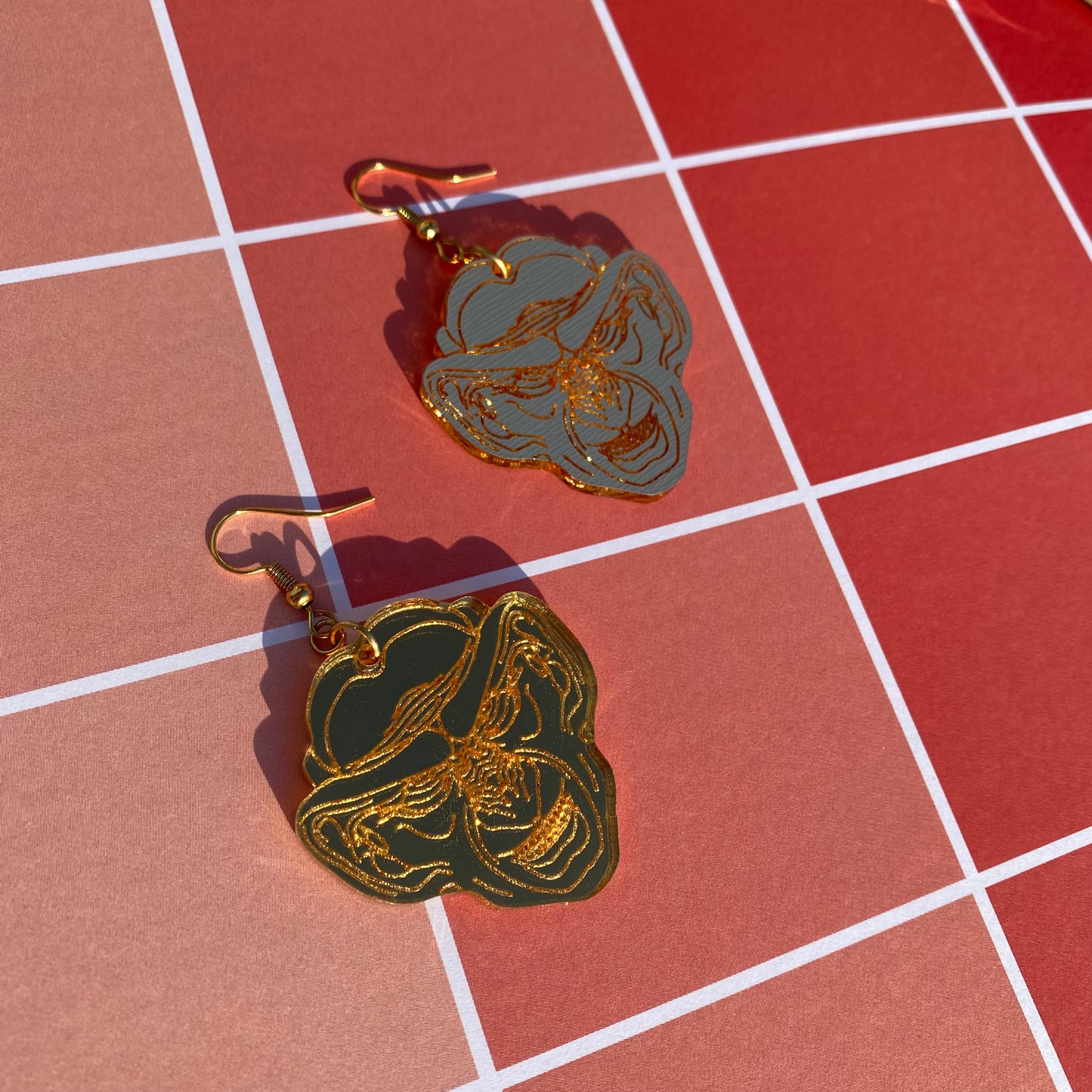 Golden Grand Nagus Acrylic Earrings