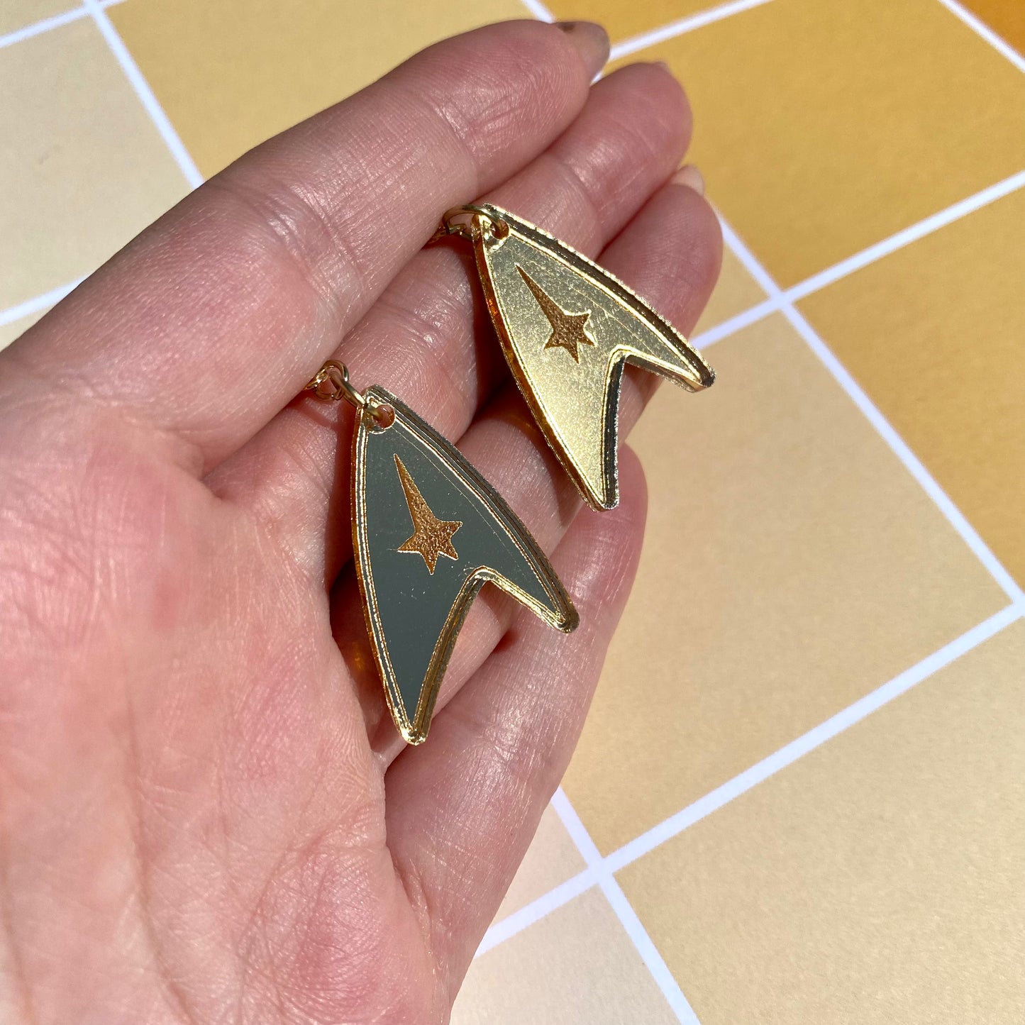 Gold TOS Badge Acrylic Earrings