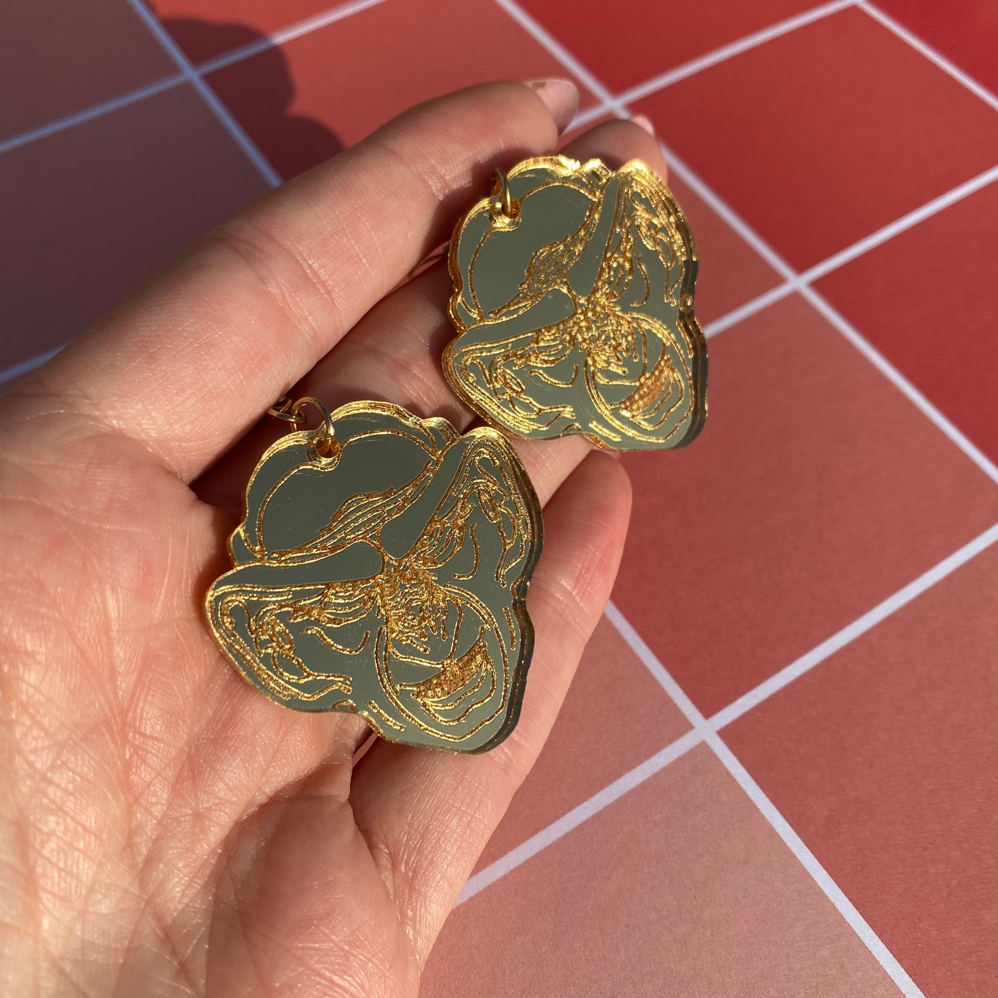 Golden Grand Nagus Acrylic Earrings