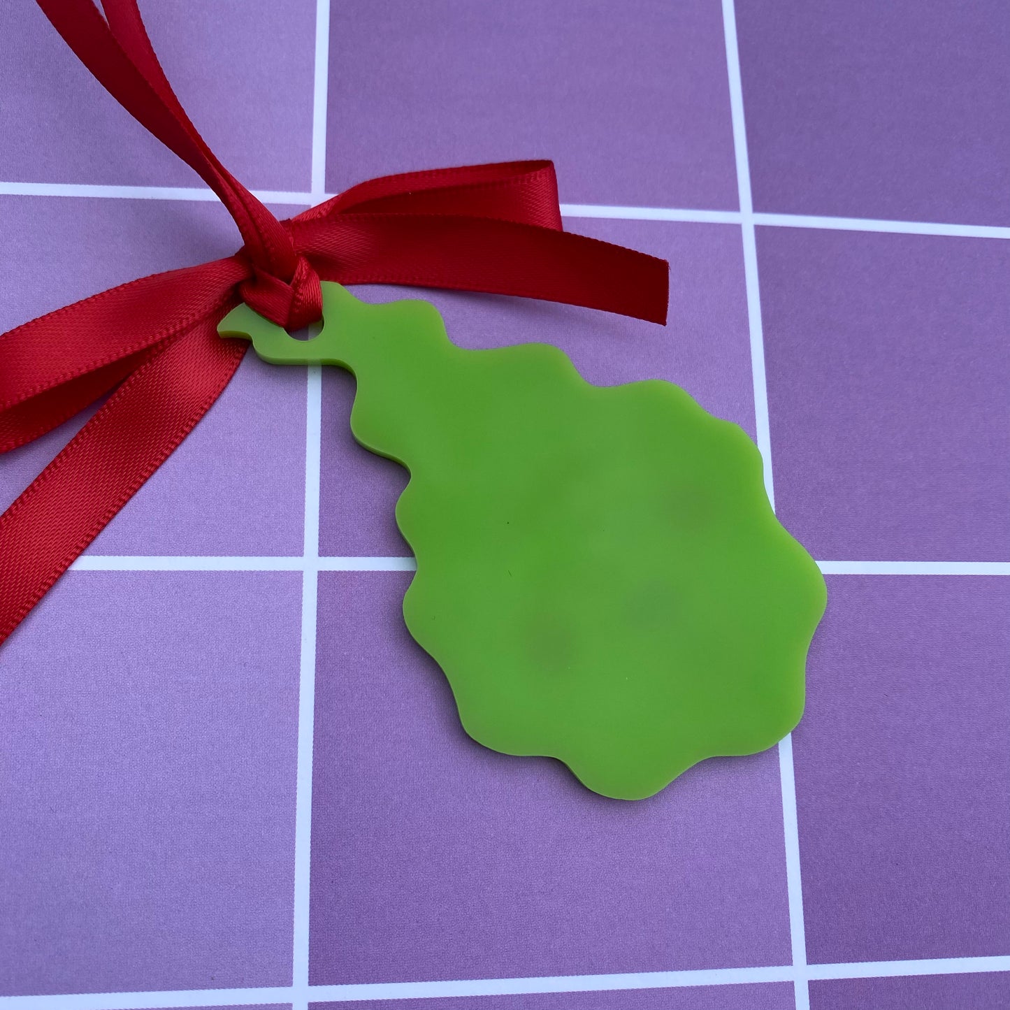 Disgusted Dimple Acrylic Ornament