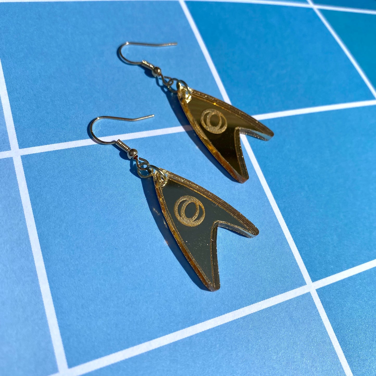 Gold TOS Badge Acrylic Earrings