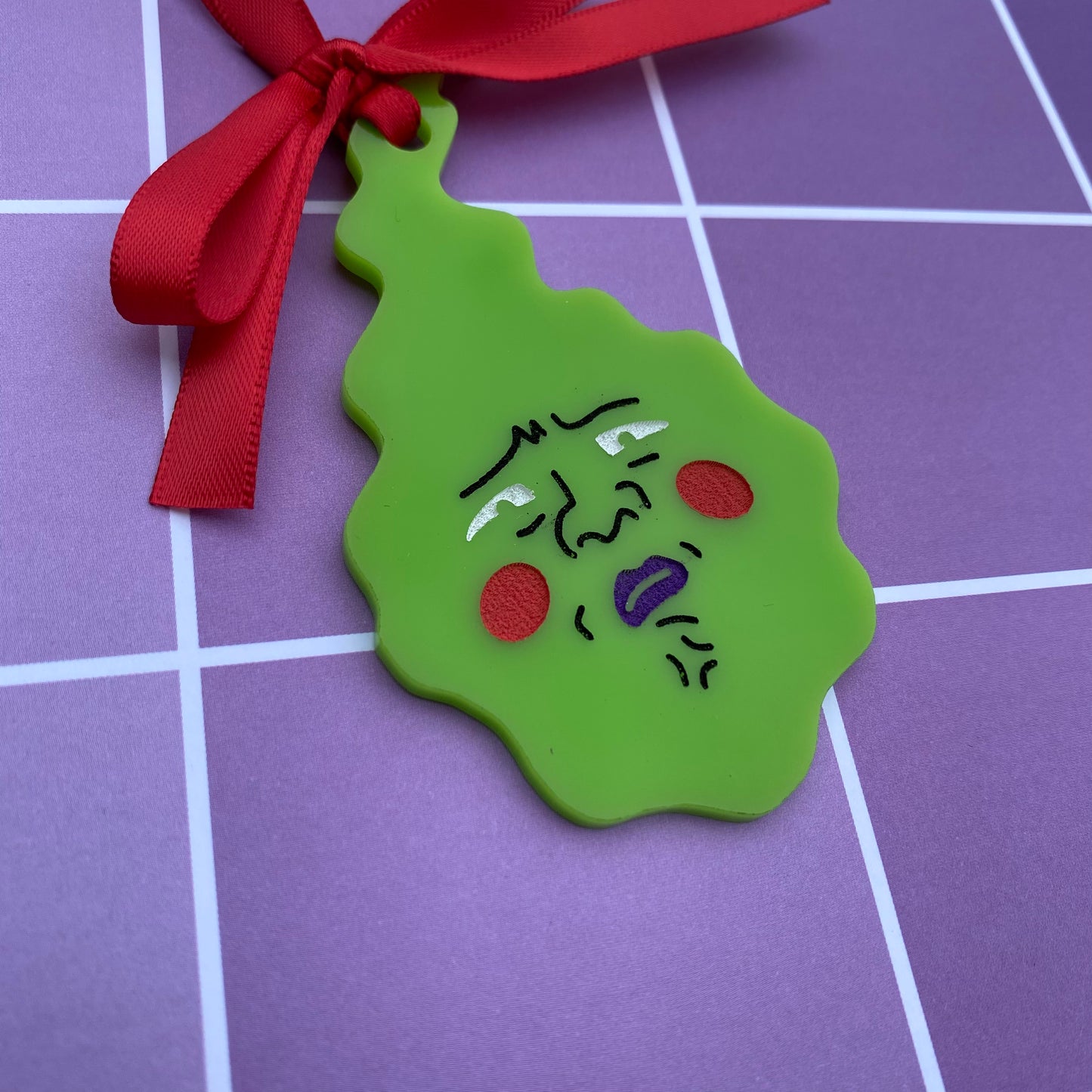 Disgusted Dimple Acrylic Ornament