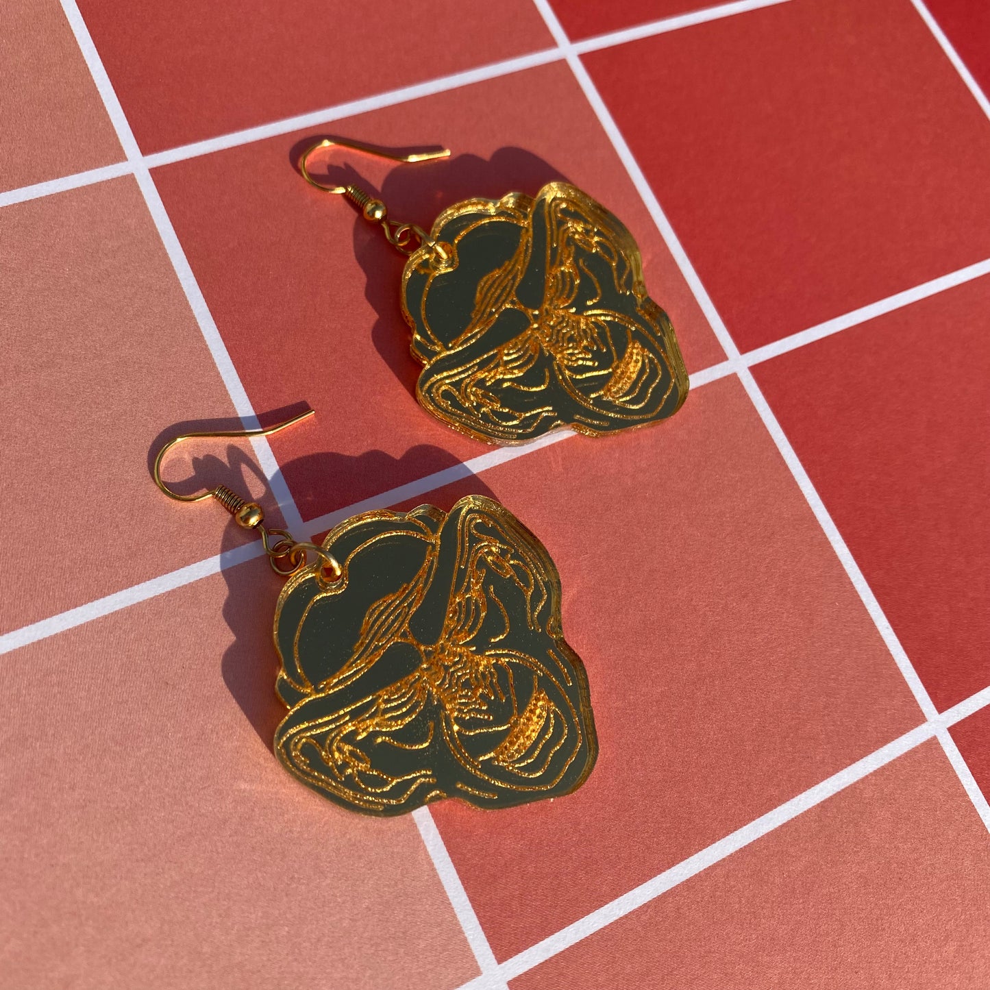 Golden Grand Nagus Acrylic Earrings