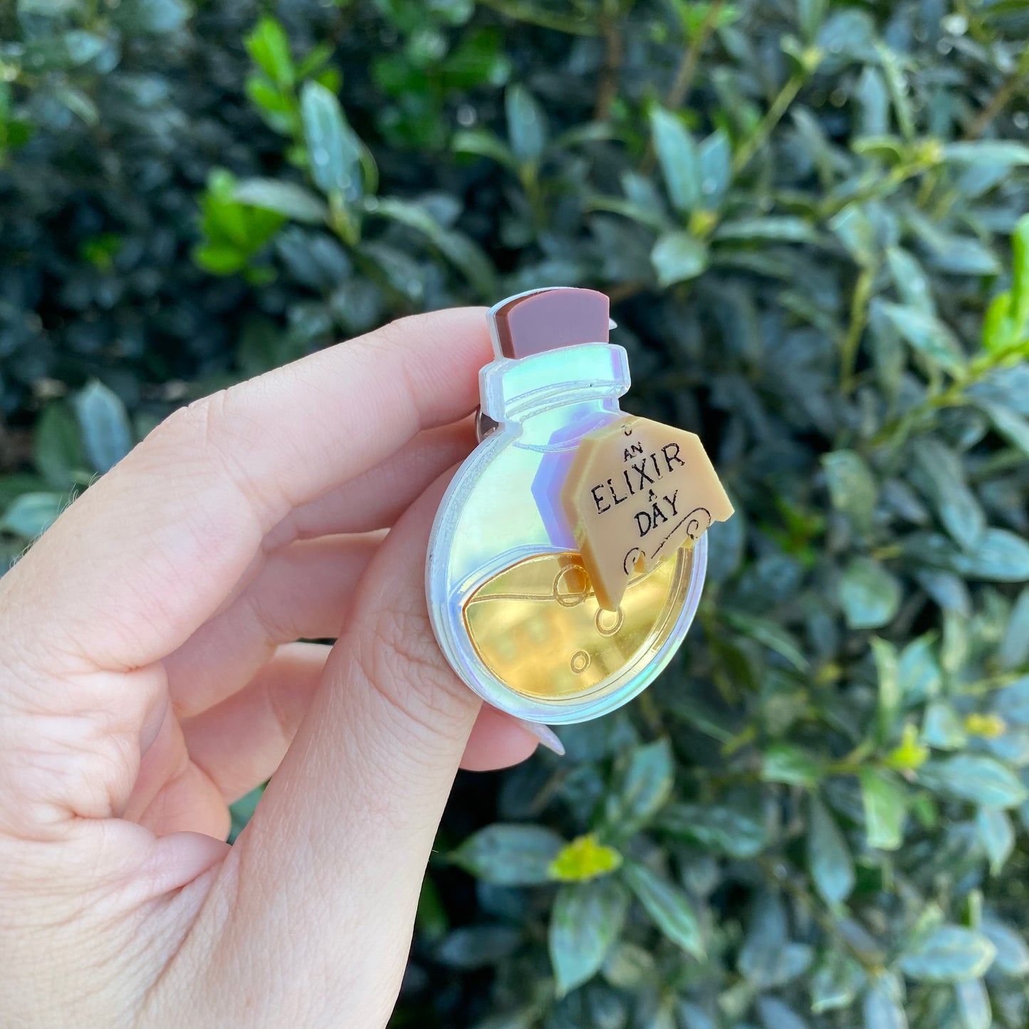 A Golden Elixer a Day Acrylic Pin