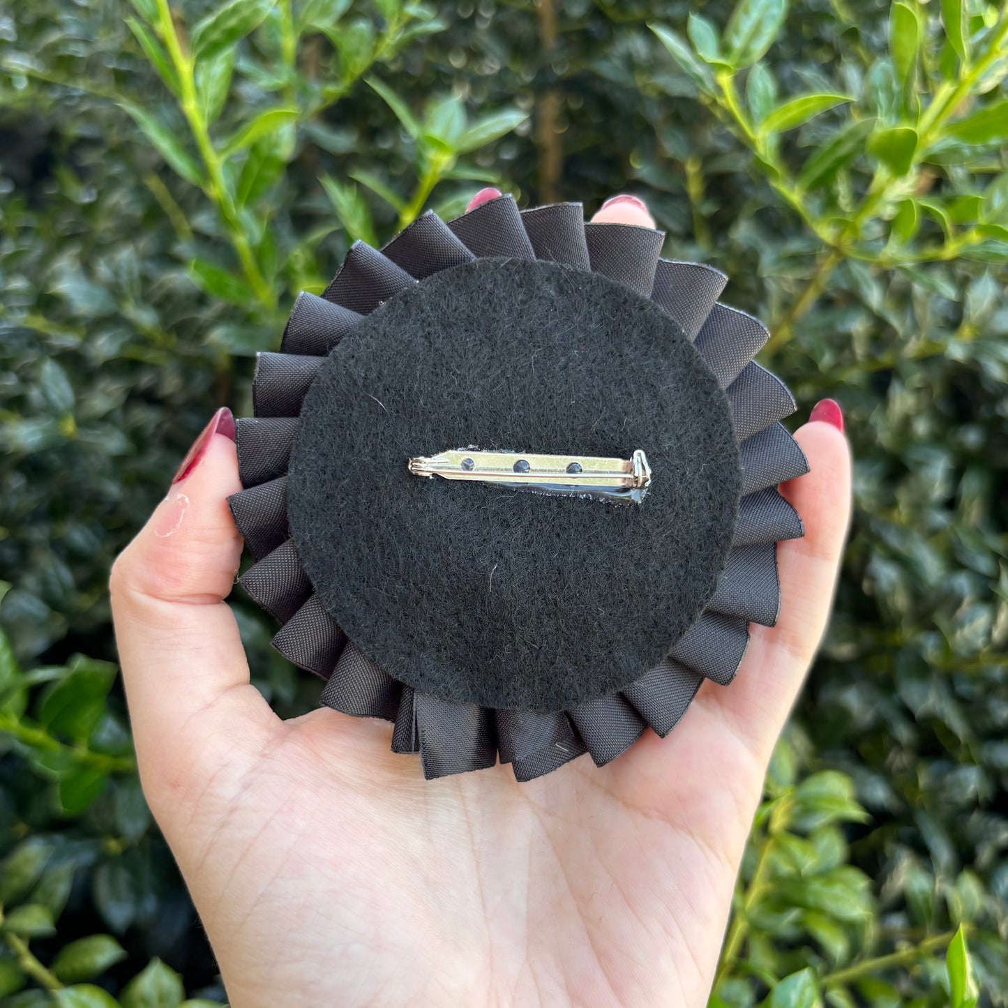 Bite Risk Ribbon Rosette