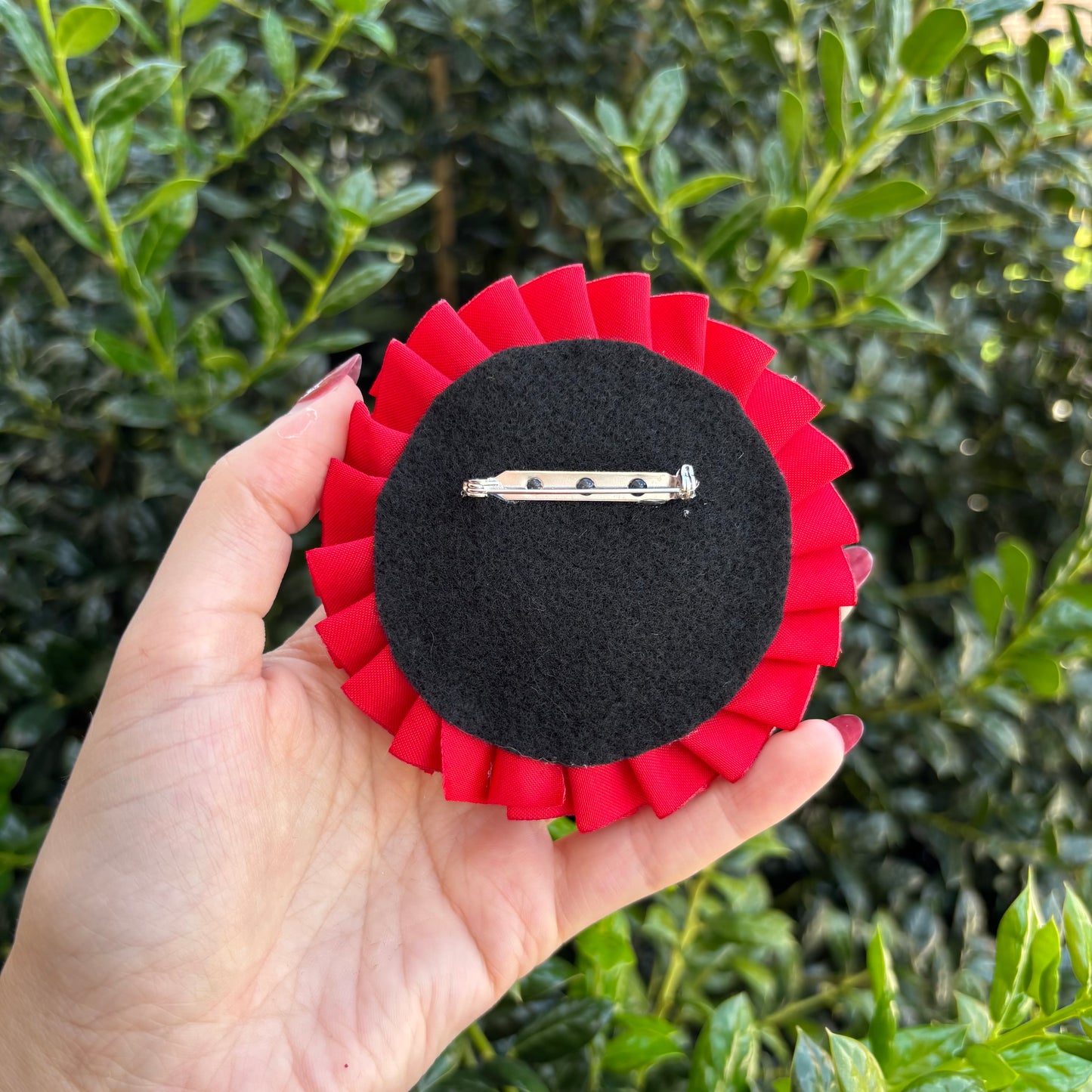 Bite Risk Ribbon Rosette