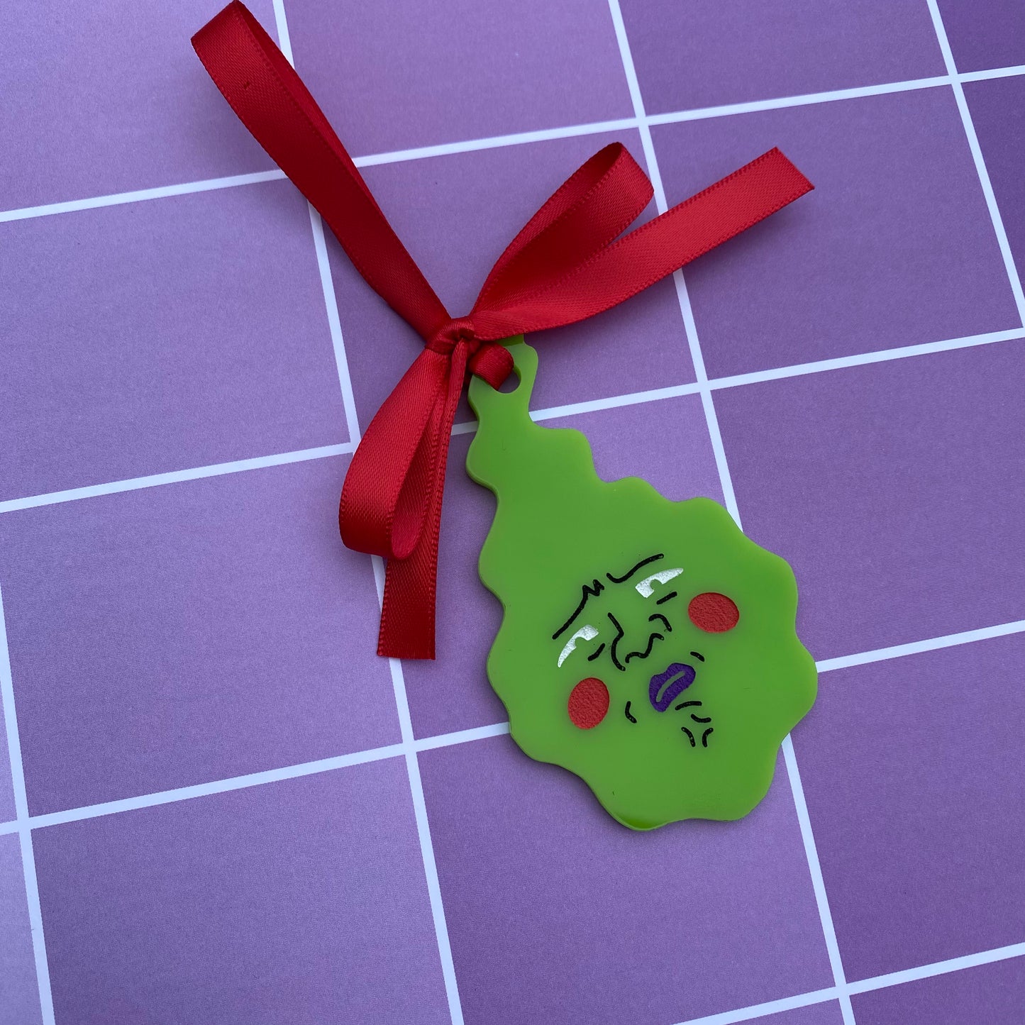 Disgusted Dimple Acrylic Ornament